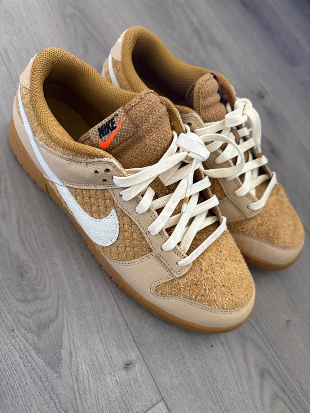 Nike Mens Beige and White Low-Top Sneakers with Orange Swoosh Accent